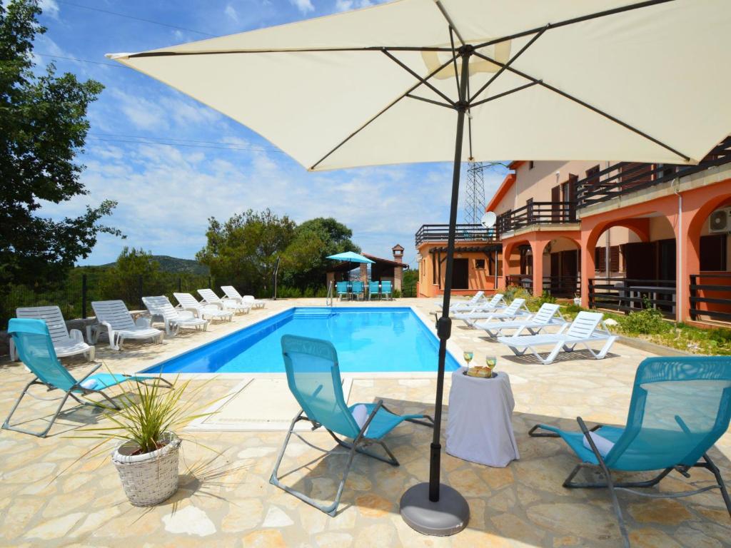 Apartment Luce hero view Dalmatia Croatia exterior view with pool and garden